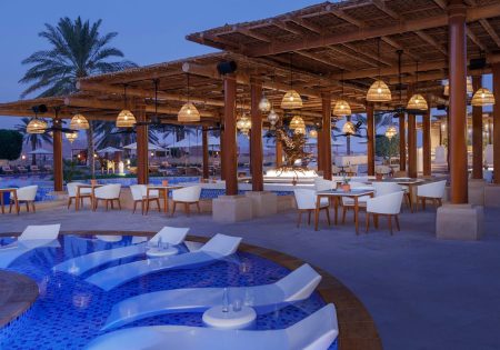 qasr al sarab desert resort by anantara restaurants naseem pool bar twilight 1920x1037